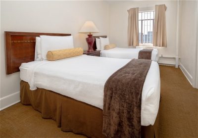 Baroness Hotel bed room with twin bed
