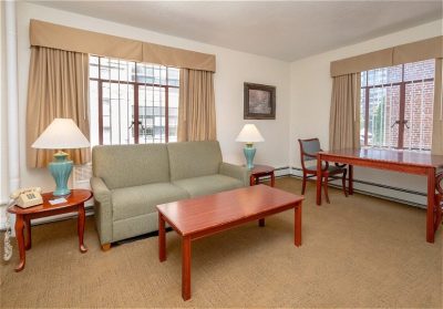 Baroness Hotel room with couch