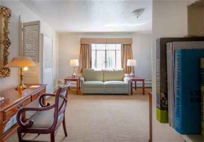 Baroness Hotel room with writing desk and couch