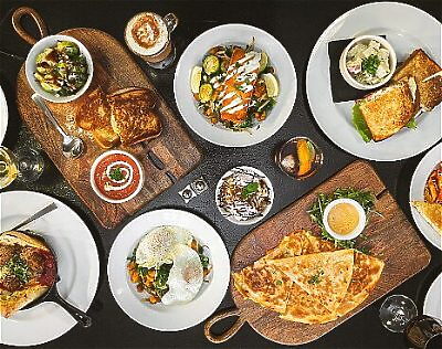 a variety of food dishes at The Rho Cafe